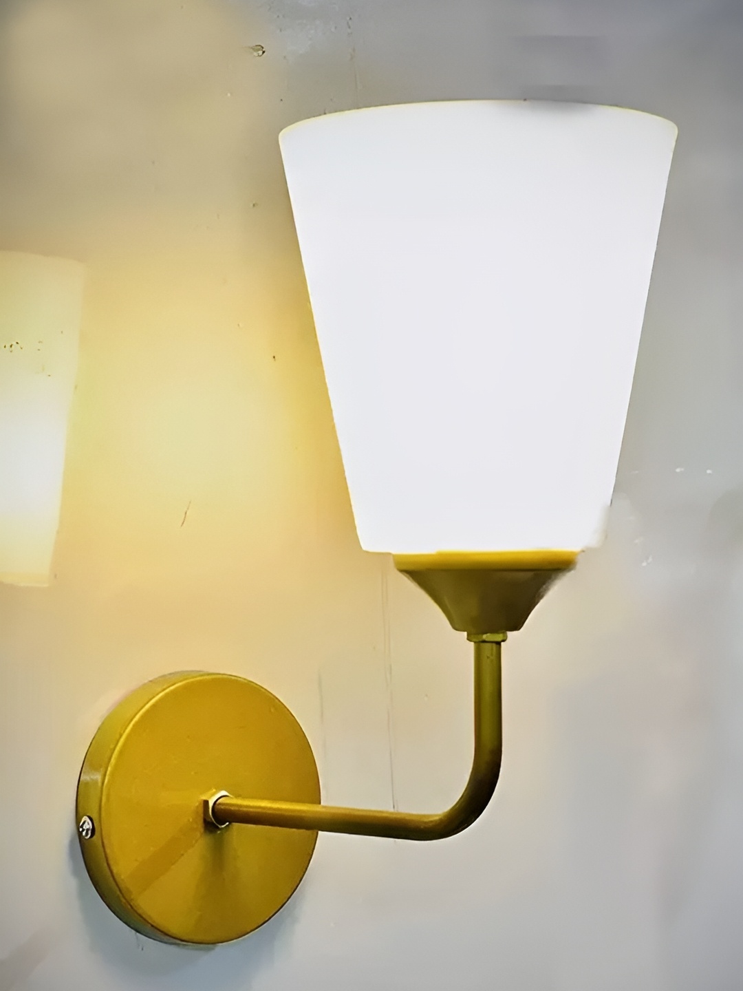 

Whiteray Gold-Toned & White Metal Contemporary Frustum Shaped Wall Lamp
