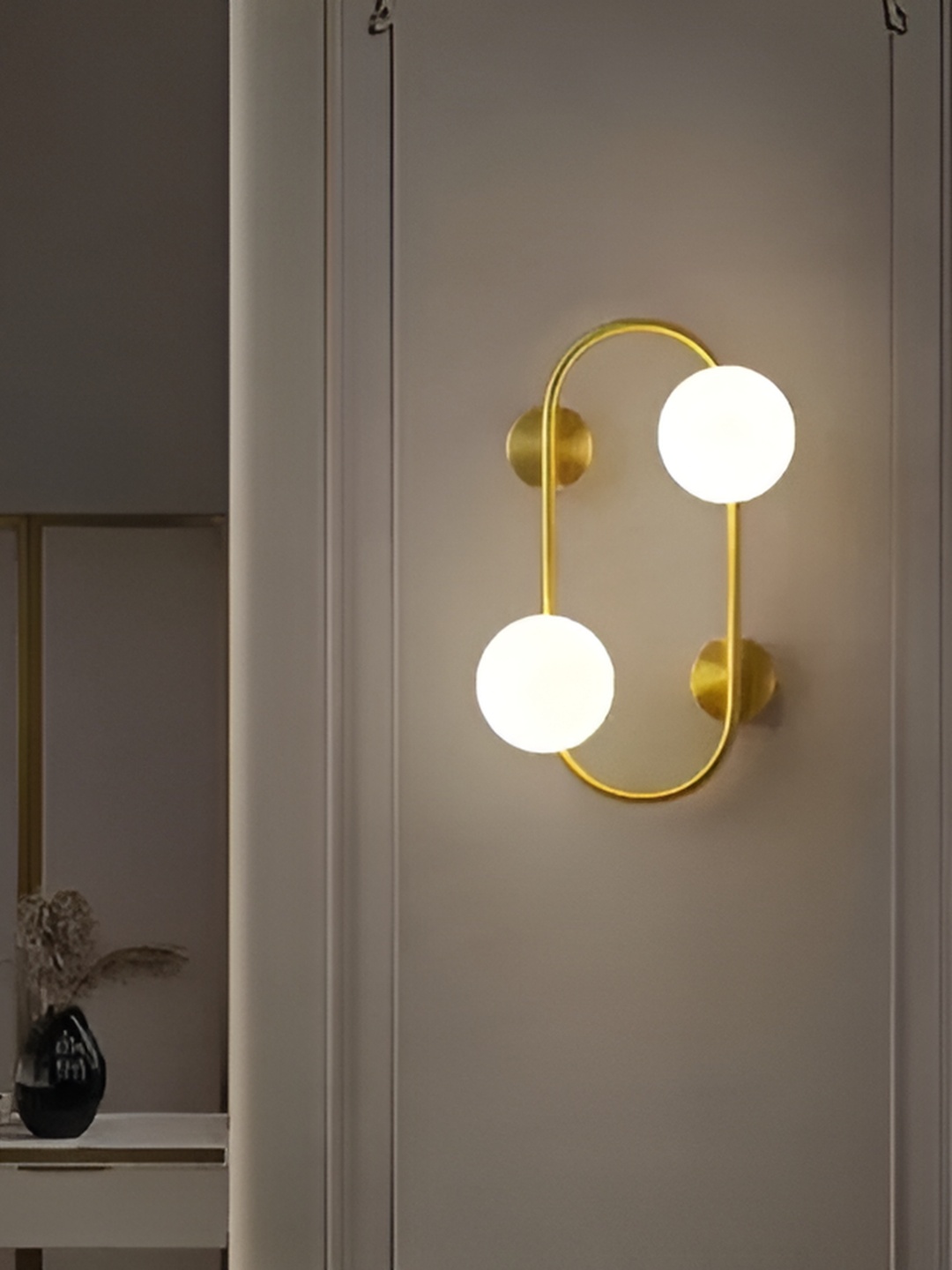 

Whiteray Gold-Toned & White Spherical Shaped Contemporary Wall Lamp