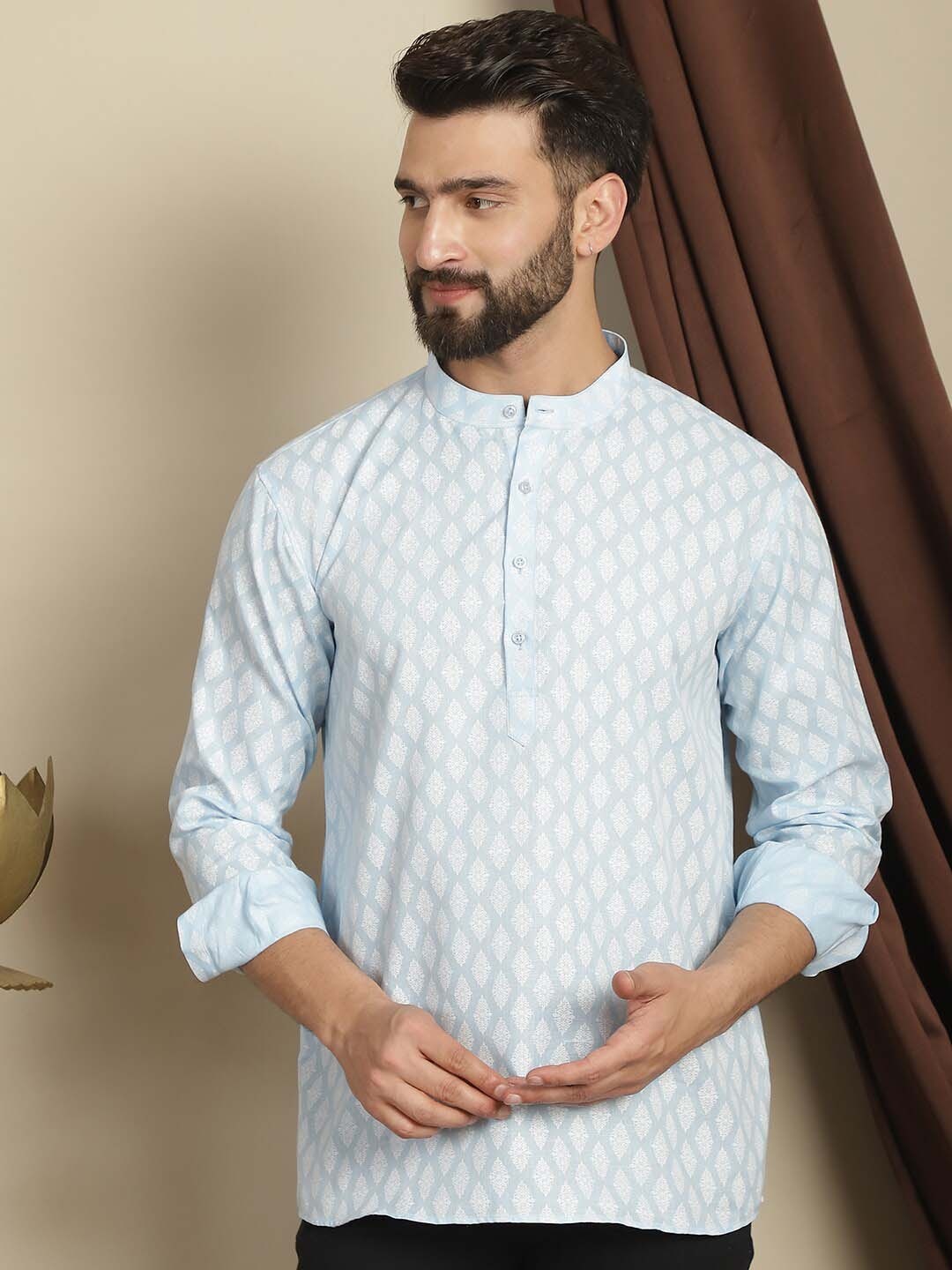 

Anouk Geometric Mandarin Collar Long Sleeves Thread Work Short Kurta, Turquoise blue