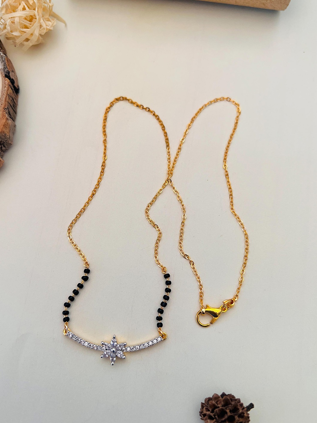 

Anouk Gold-Plated AD-Studded & Beaded Mangalsutra