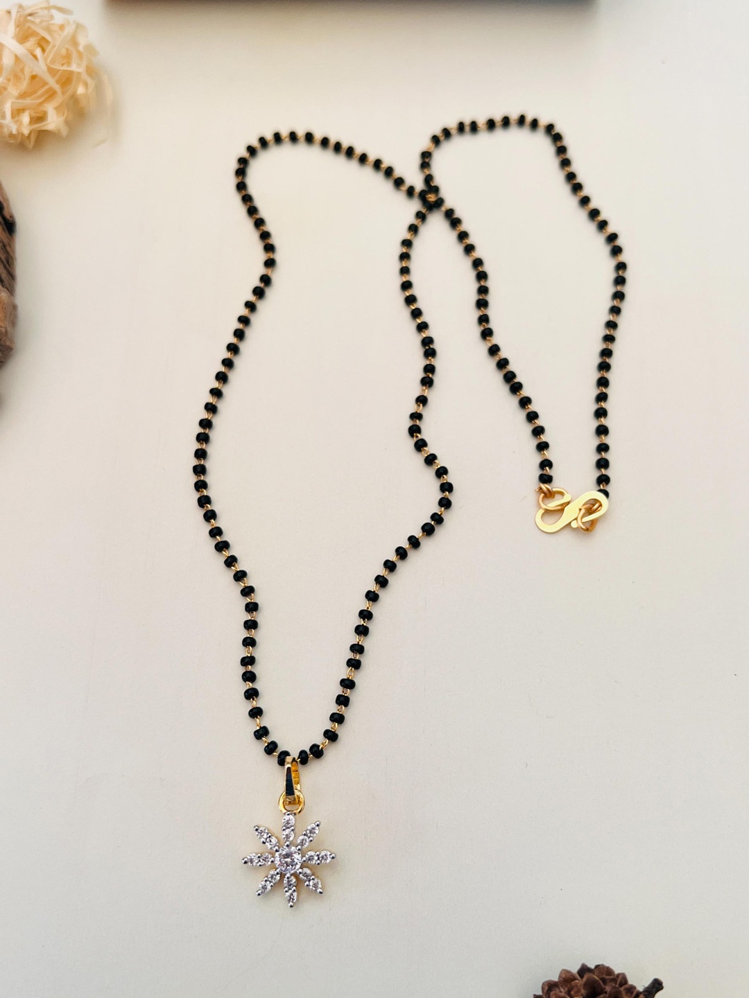 

Anouk Gold-Plated AD-Studded & Beaded Mangalsutra