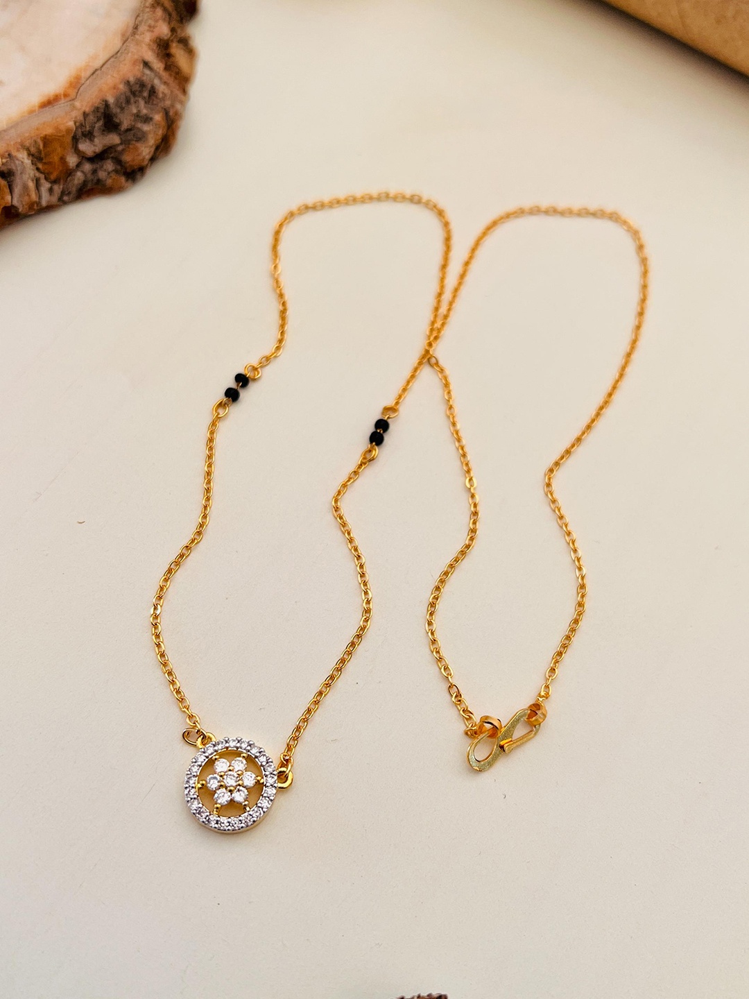 

Anouk Gold-Plated AD-Studded & Beaded Mangalsutra