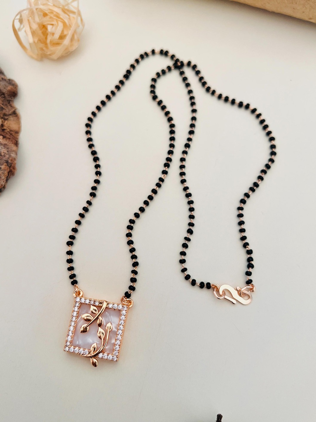 

Anouk Rose Gold-Plated AD-Studded & Beaded Mangalsutra