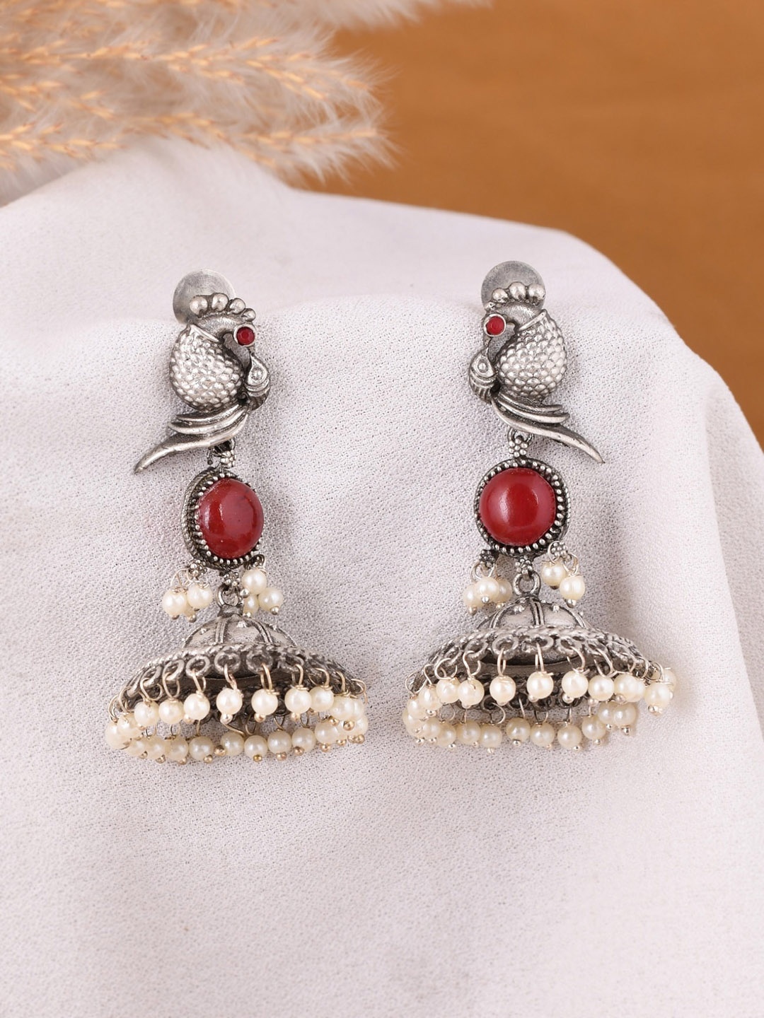 

DASTOOR Silver-Plated Peacock Shaped Jhumkas Earrings