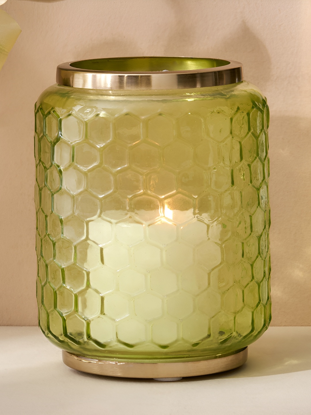 

Home Centre Green Glass Honeycomb Candle Holder