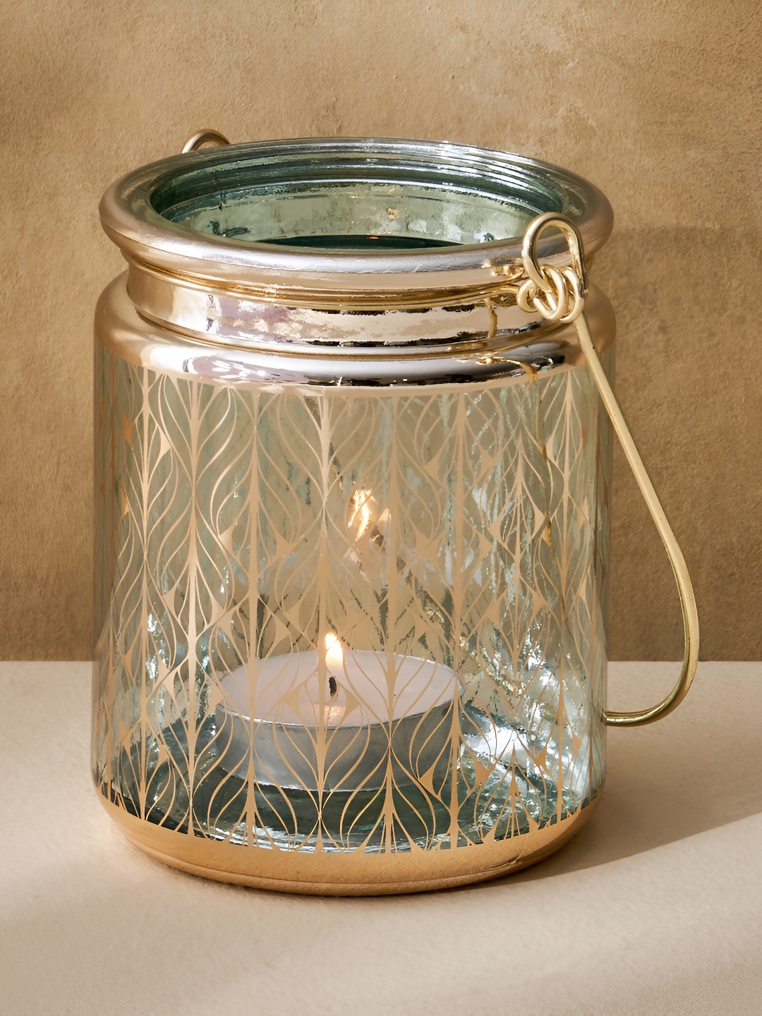 

Home Centre Green & Rose Gold Glass Candle Lantern