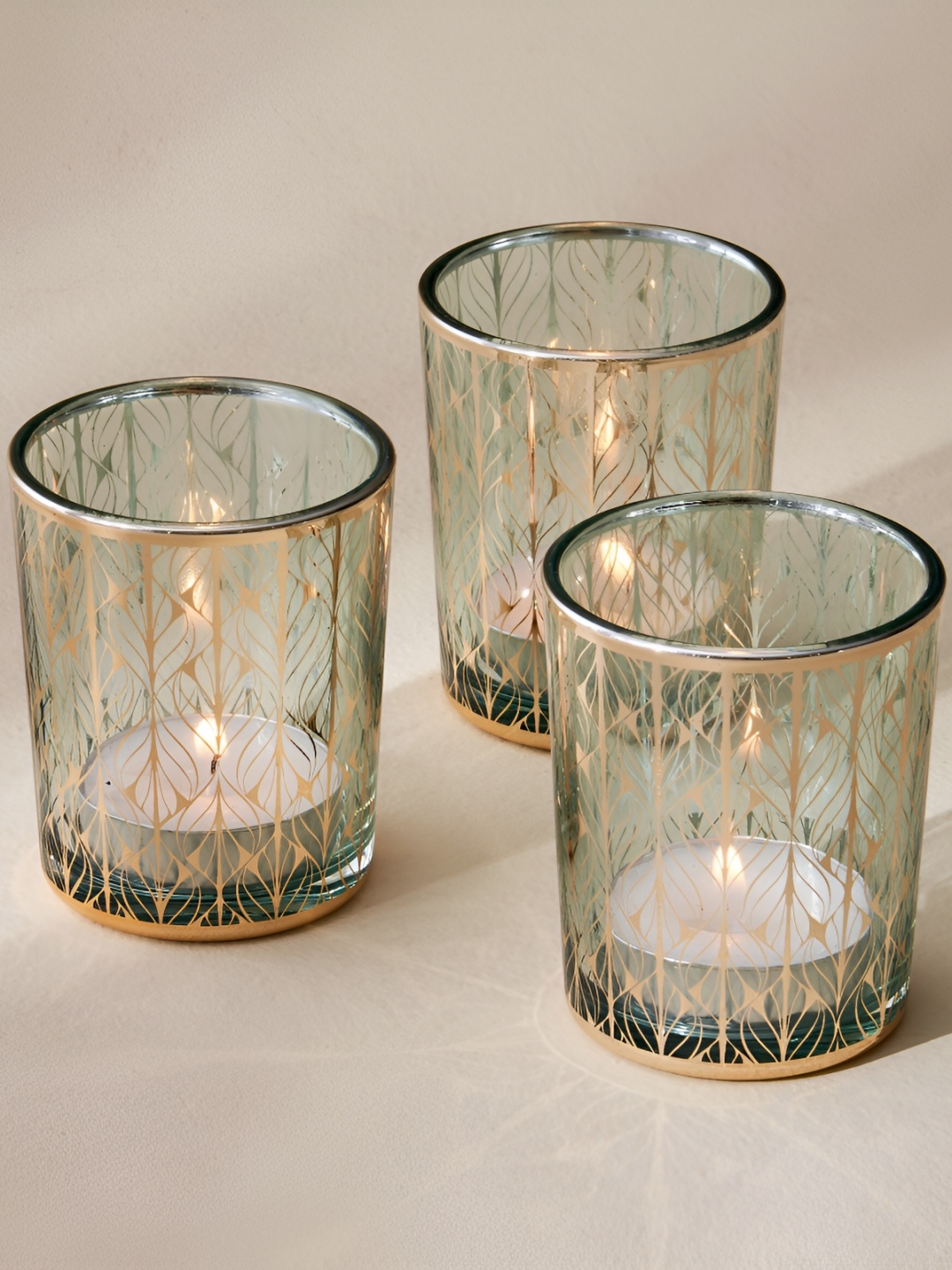 

Home Centre Green & Gold-Toned 3 Pieces Glass Candle Holders