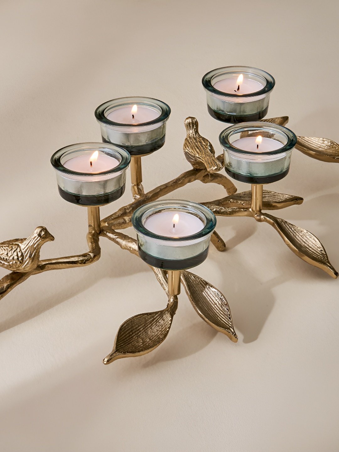 

Home Centre Beige & Transparent Glass T-Light Holder