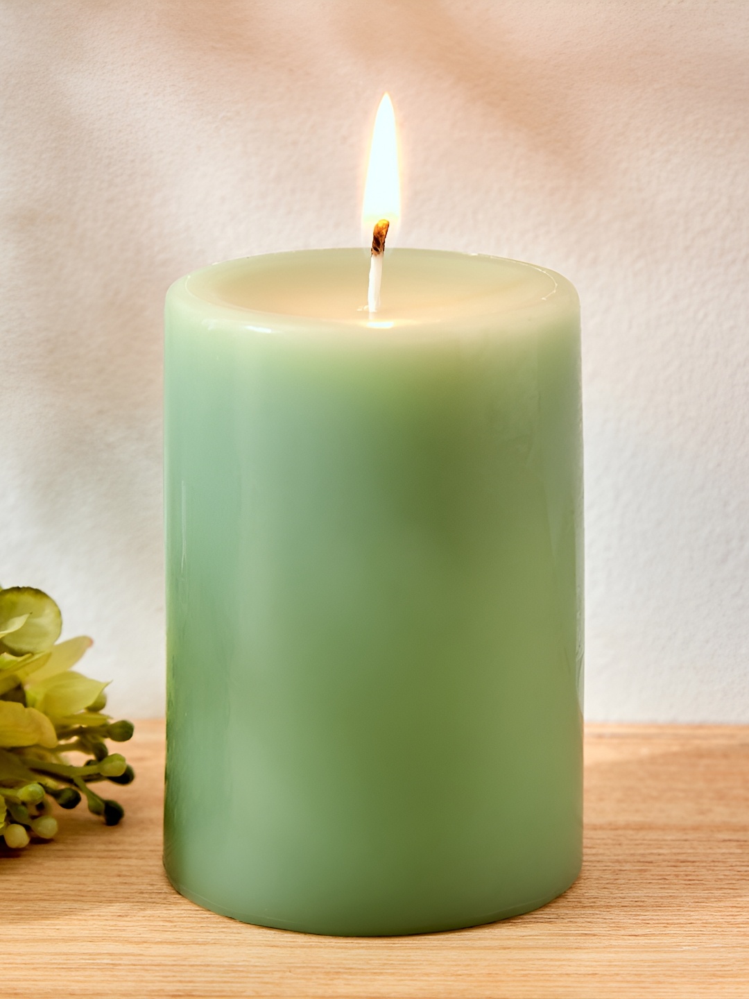 

Home Centre Green Wax Sea Breeze Scented Pillar Candle