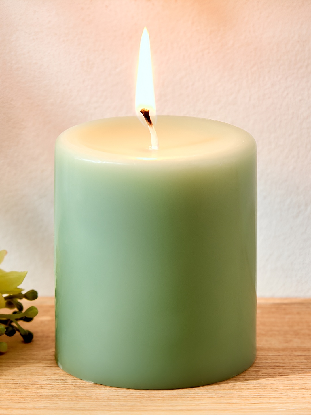 

Home Centre Green Wax Sea Breeze Scented Pillar Candle