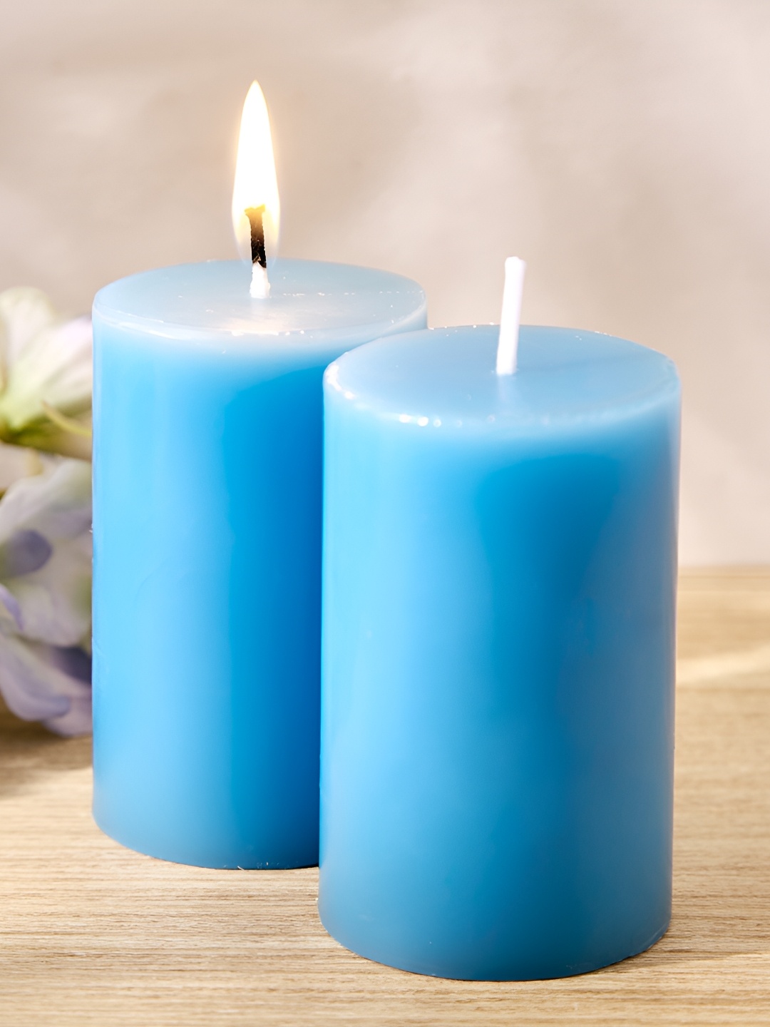 

Home Centre Blue 2 Pieces Blueberry Scented Pillar Candles