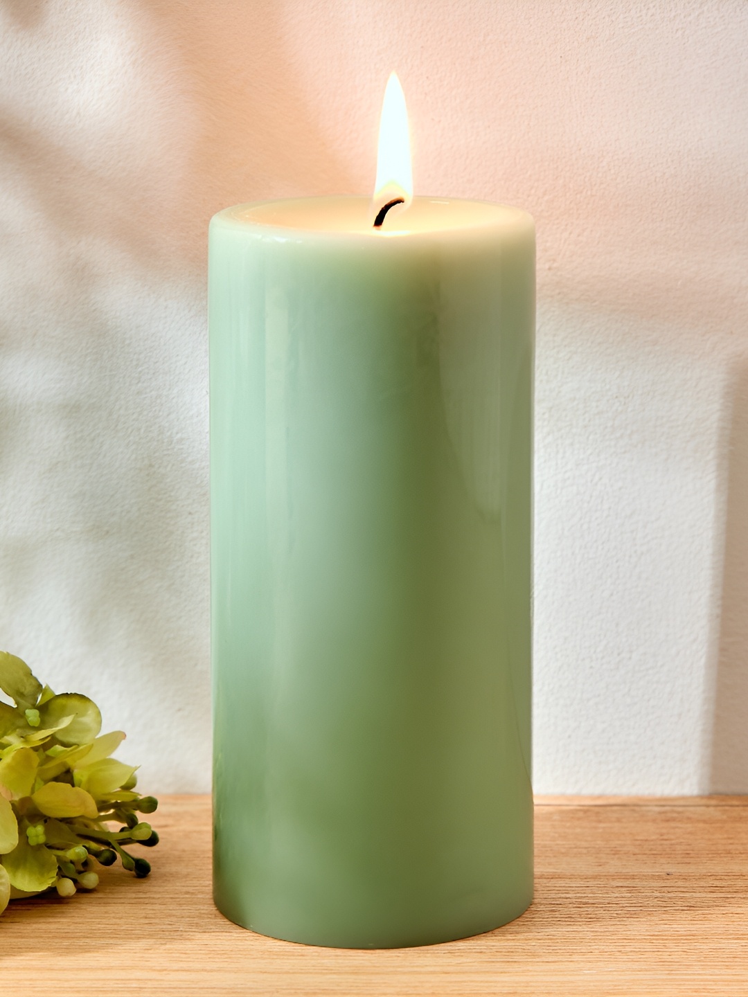 

Home Centre Green Wax Sea Breeze Scented Pillar Candle