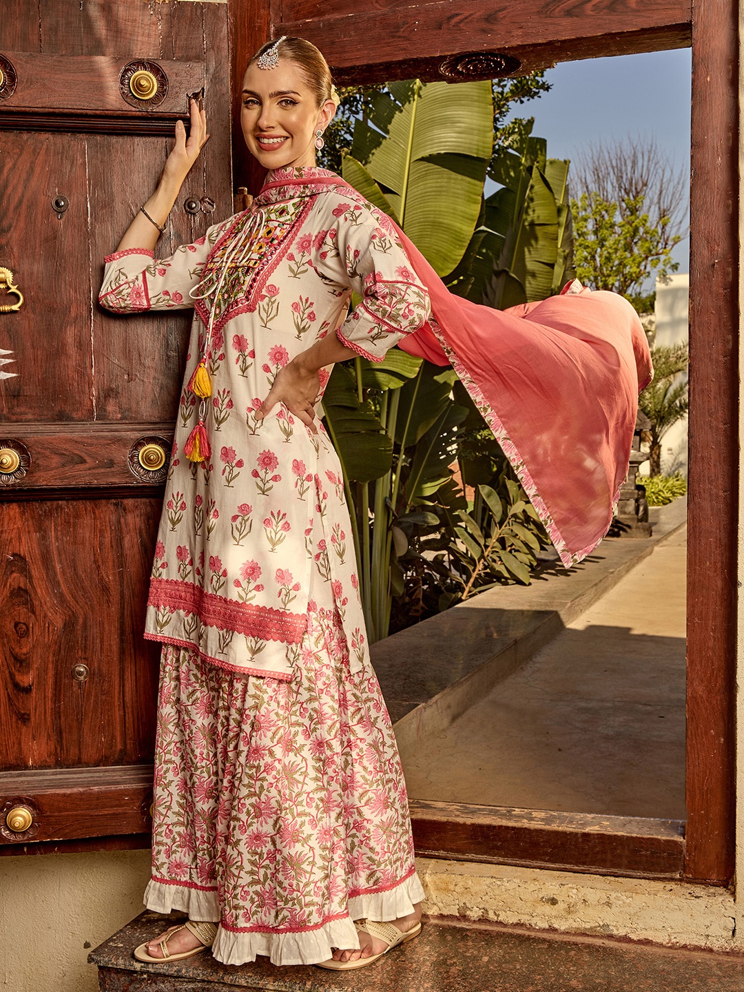 

Ishin Floral Printed Mirror work Cotton Tie-Up Kurta Paired with Sharara and Dupatta, White