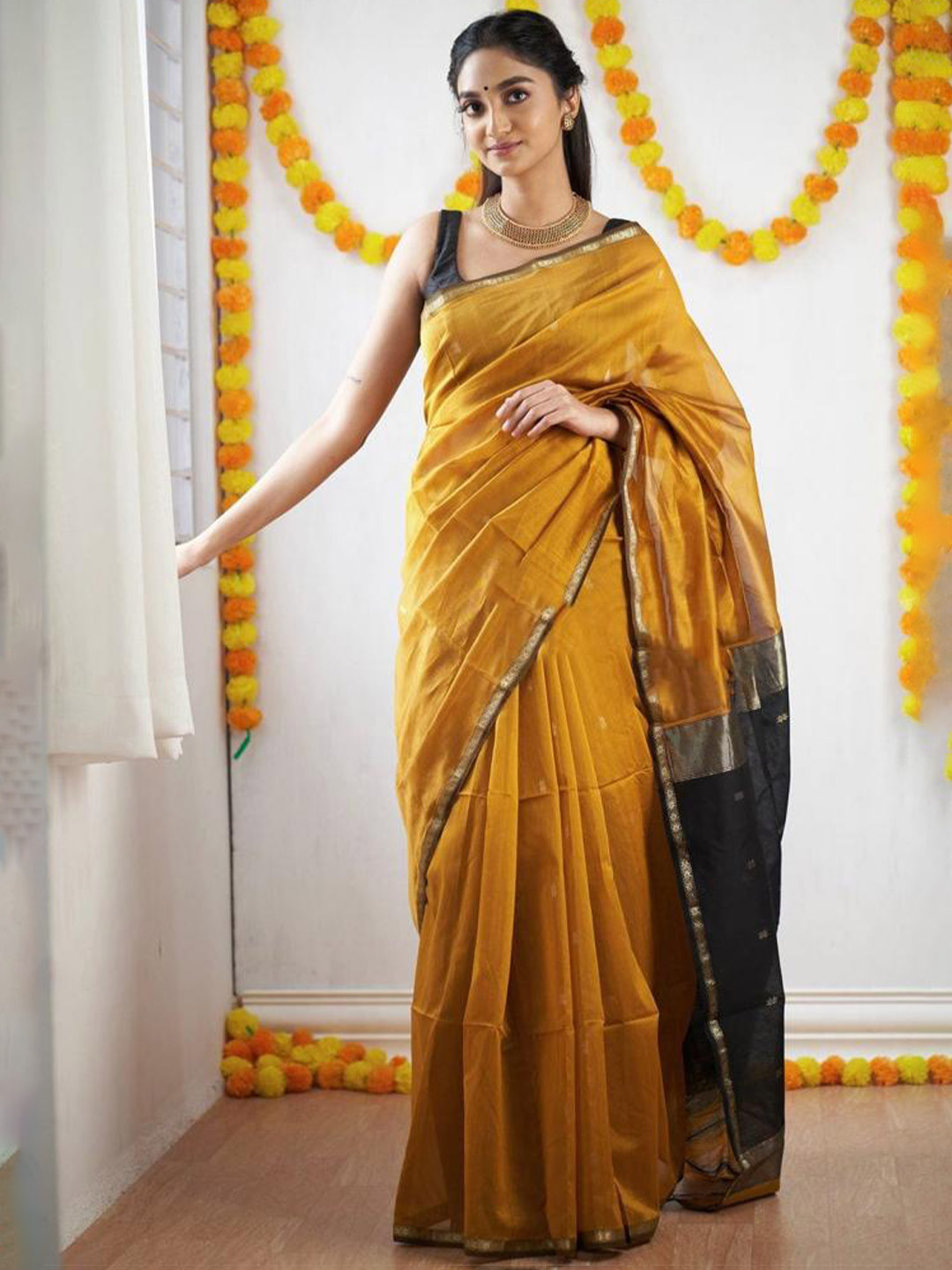 

nirja Fab Ethnic Motifs Zari Silk Blend Kanjeevaram Saree, Yellow