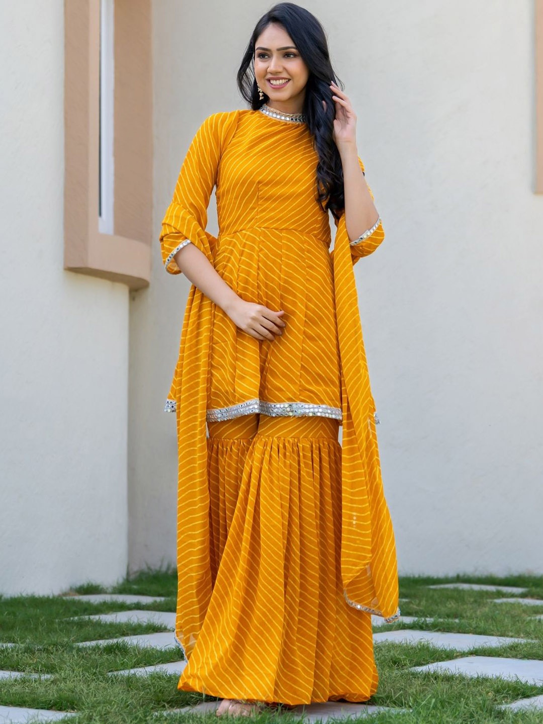 

HOUSE OF JAMOTI Leheriya Printed Pleated Mirror Work Anarkali Kurti with Sharara & Dupatta, Mustard