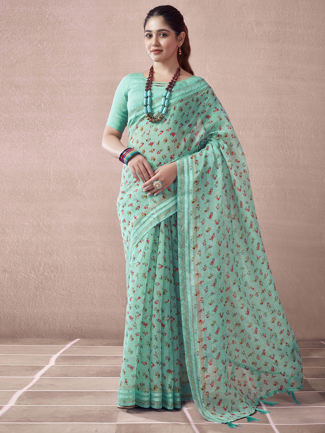 

KALINI Floral Zari Ikat Saree, Turquoise blue