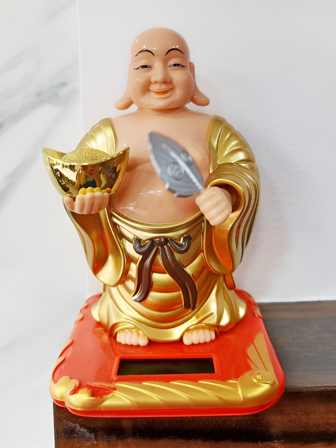 

Shubhanjali Solar Laughing Buddha Statue Showpiece, Off white