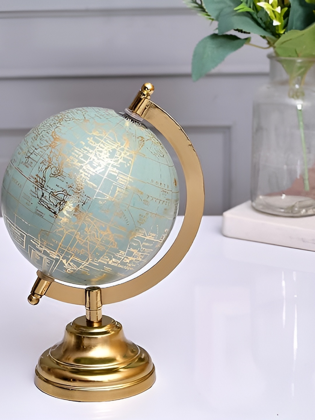 

CraftVatika Gold-Toned & Blue Curio Showpiece
