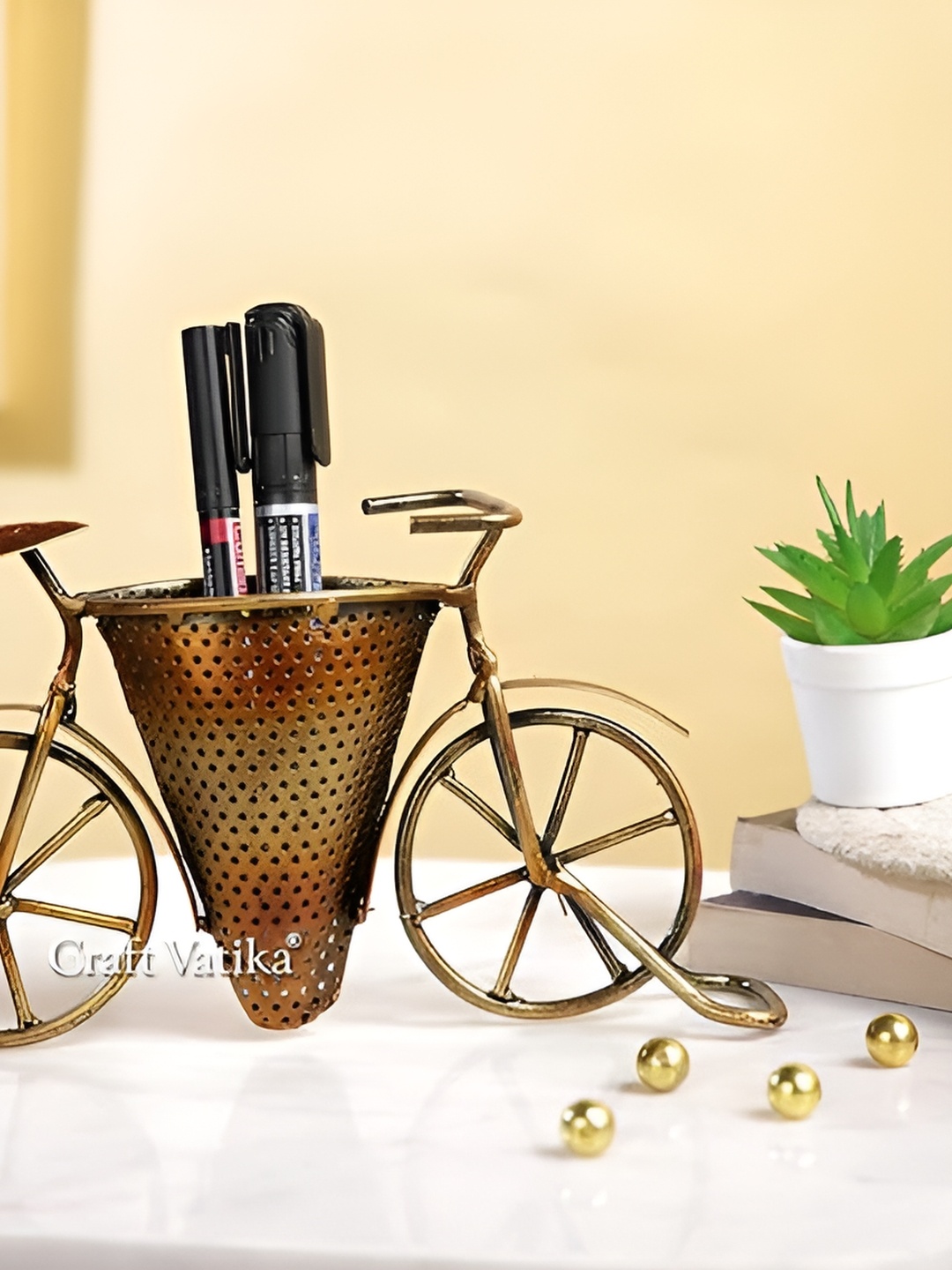 

CraftVatika Metallic Toned Curio Showpiece