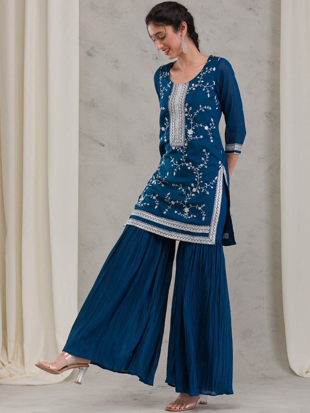 

Koskii Women Ethnic Motifs Embroidered Regular Thread Work Raw Silk Kurta with Sharara & With Dupatta, Blue