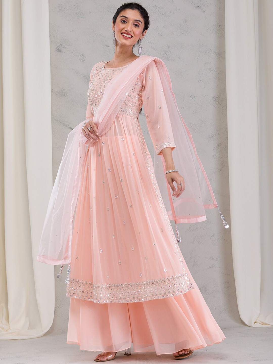 

Koskii Women Embroidered Regular Thread Work Kurta with Palazzos & With Dupatta, Peach