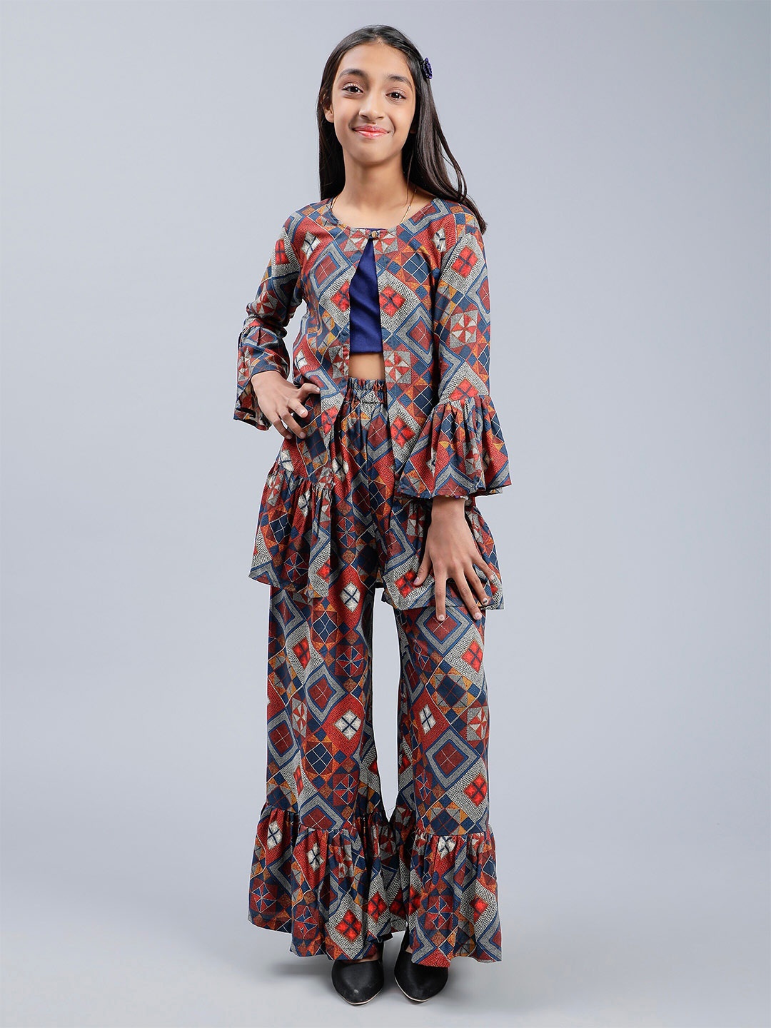 

Unique Designers Girls Printed Top With Palazzos And Shrug, Beige