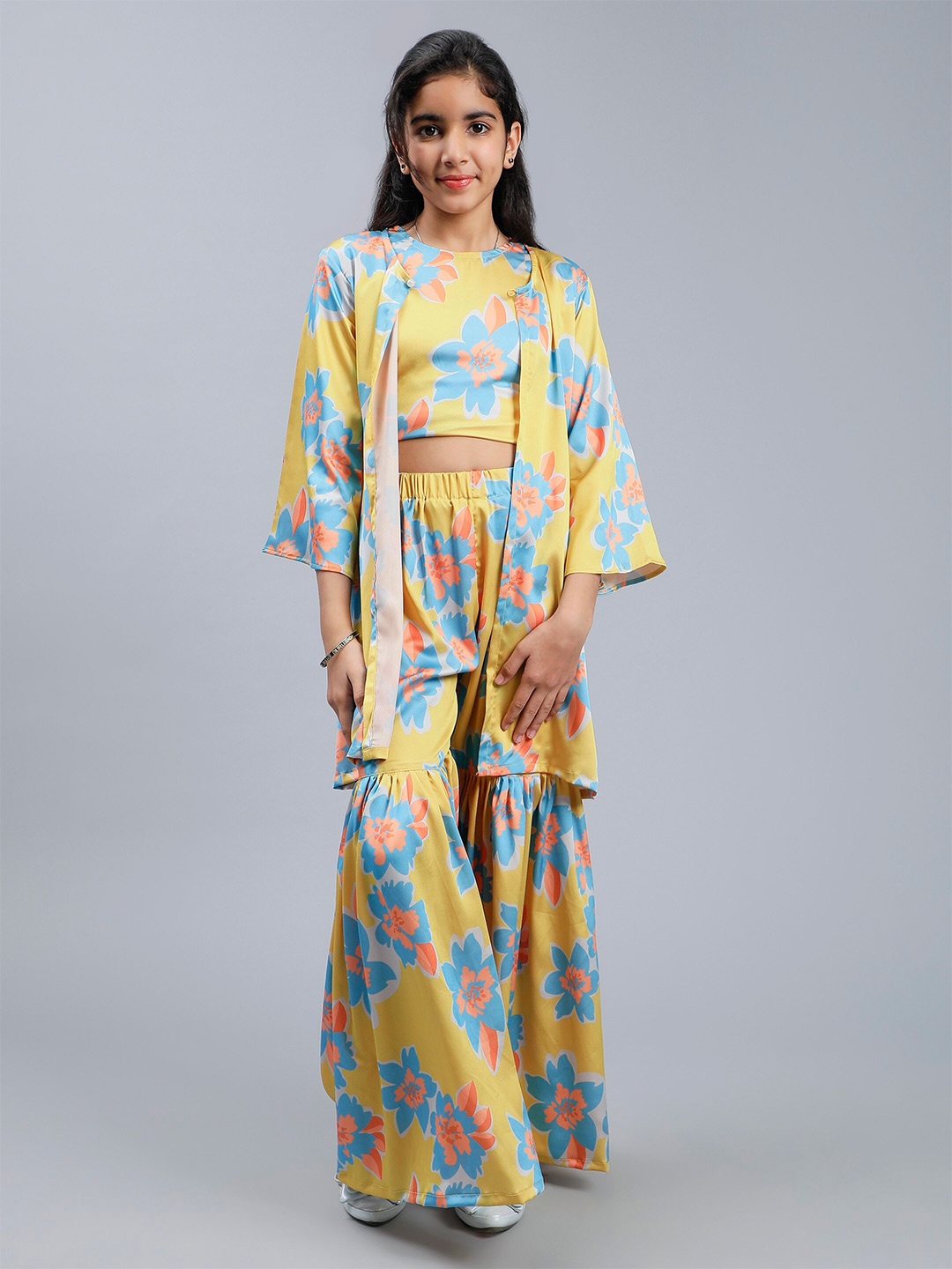 

Unique Designers Girls Floral Printed Top and Sharara With Shurg Yellow