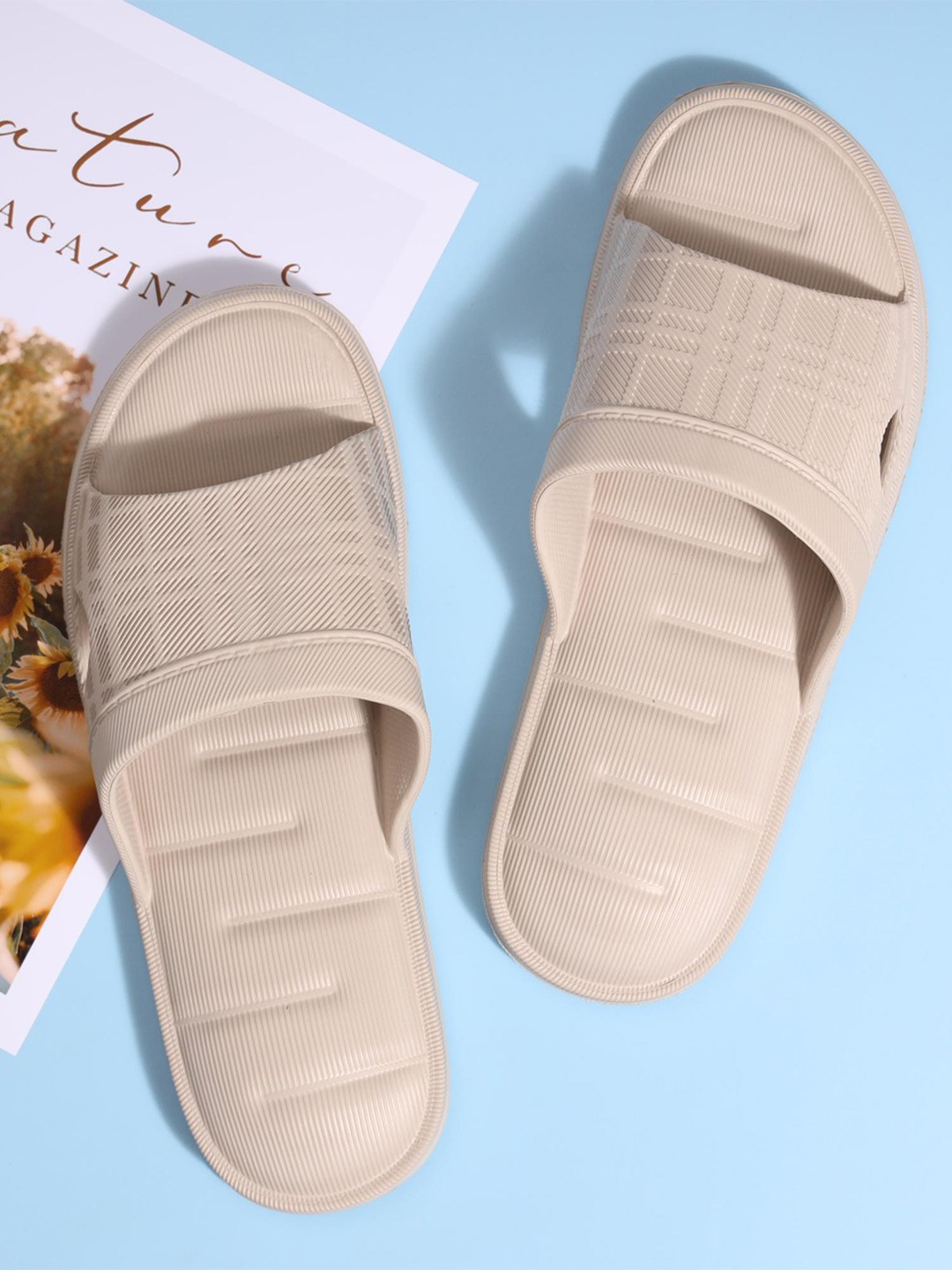 

Mast & Harbour Men Self Design Sliders, Beige
