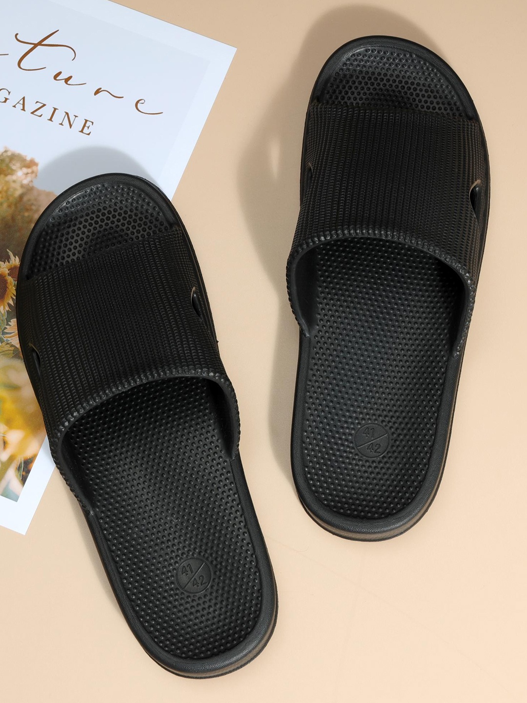 

Mast & Harbour Men Black Self Design Sliders