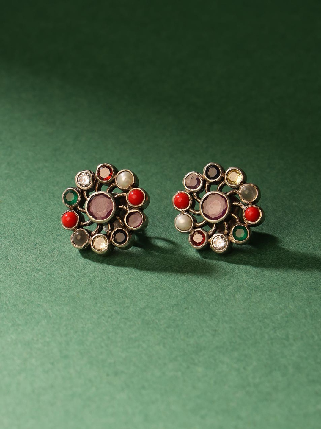 

Fabindia Silver Artificial Stones-Studded Contemporary Studs Earrings