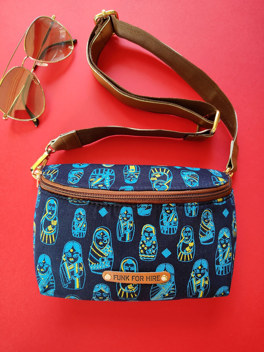 

Funk For Hire Ethnic Motifs Printed Bowling Sling Bag, Navy blue