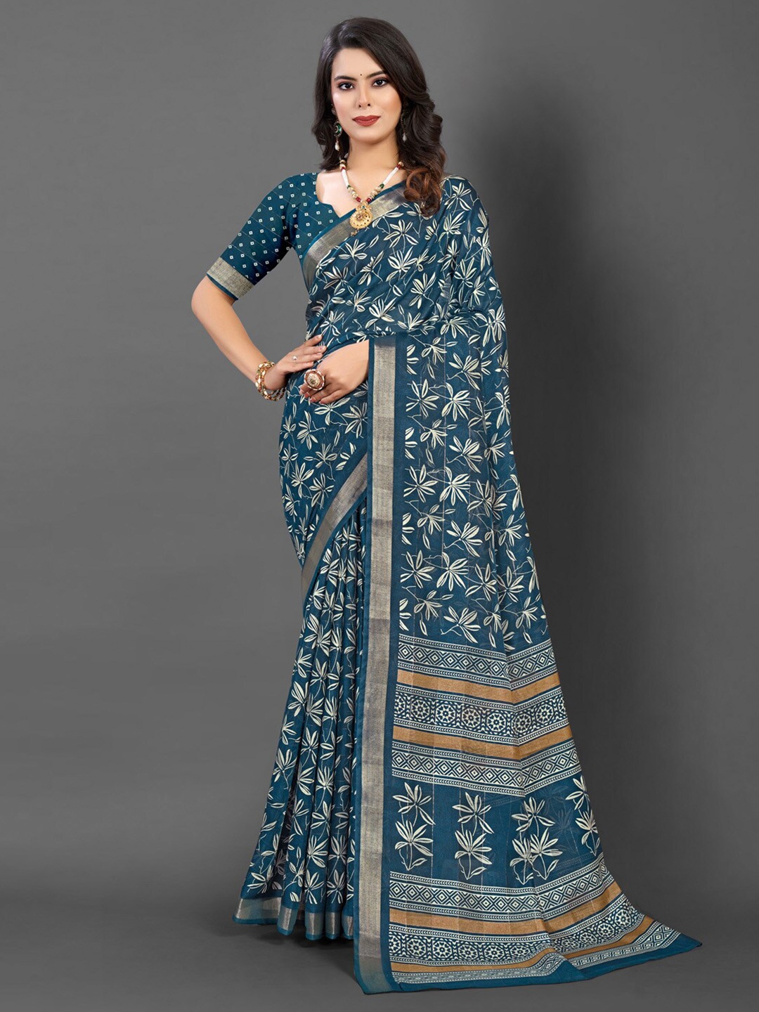 

Mitera Teal Blue Floral Printed Zari Sungudi Saree