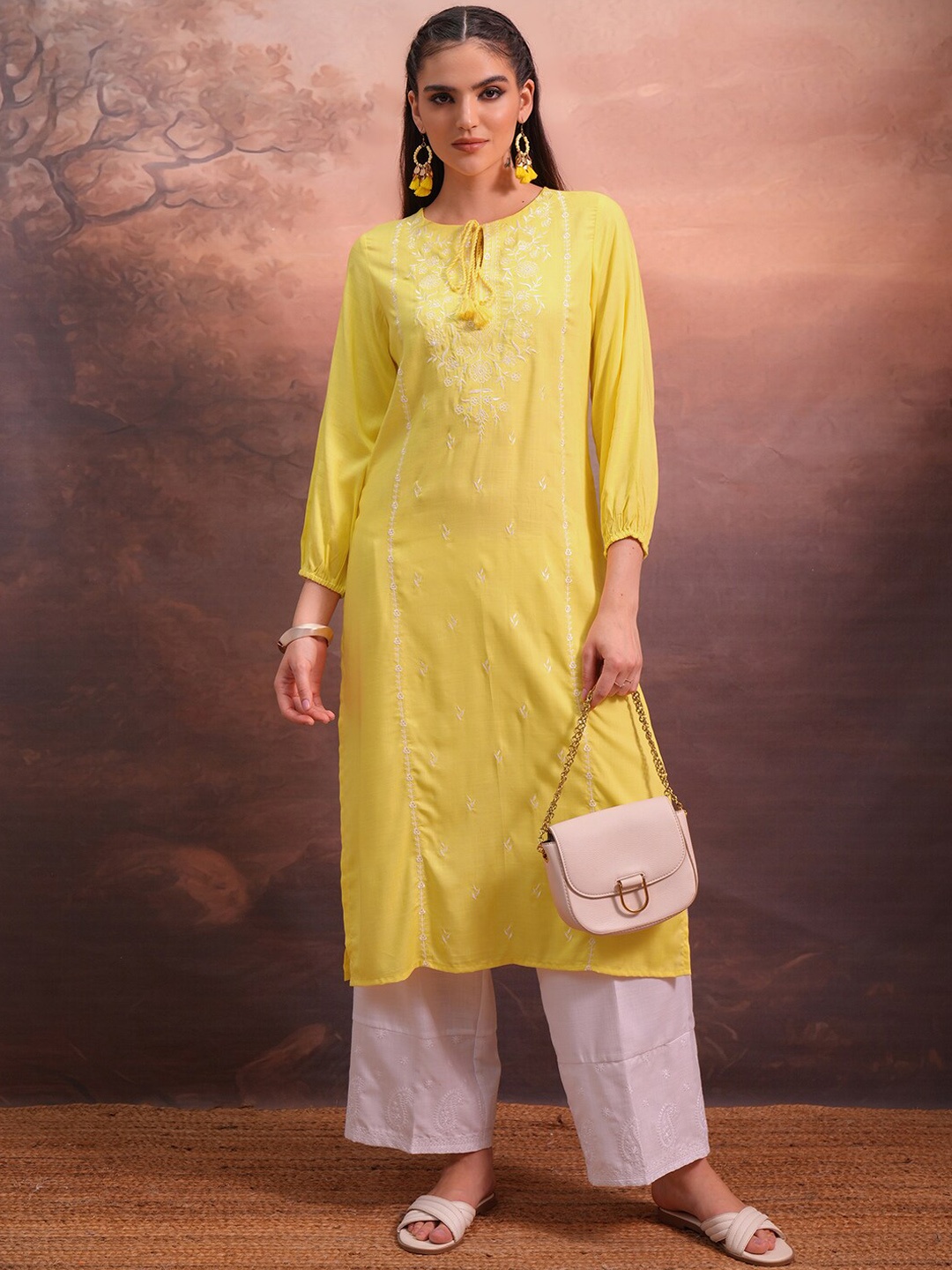 

Vishudh Yellow Ethnic Motifs Embroidered Tie-Up Neck Thread Work Straight Kurta