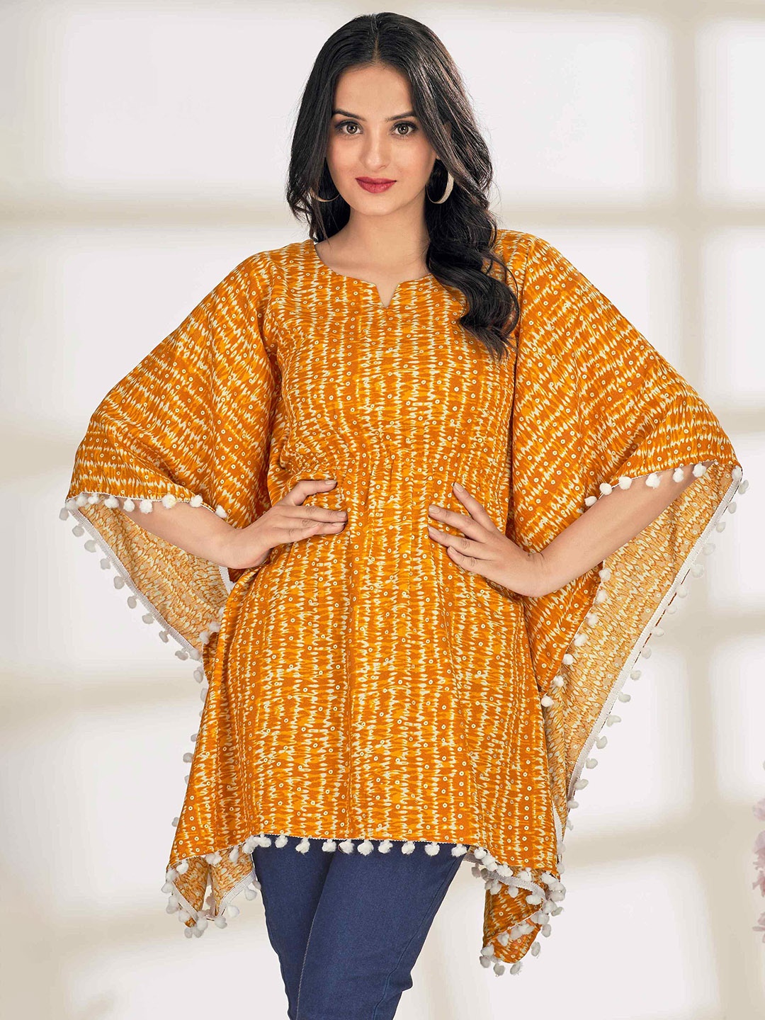 

TextileNow Printed Flared Sleeves Kaftan Kurta With Pom Pom Lace, Yellow