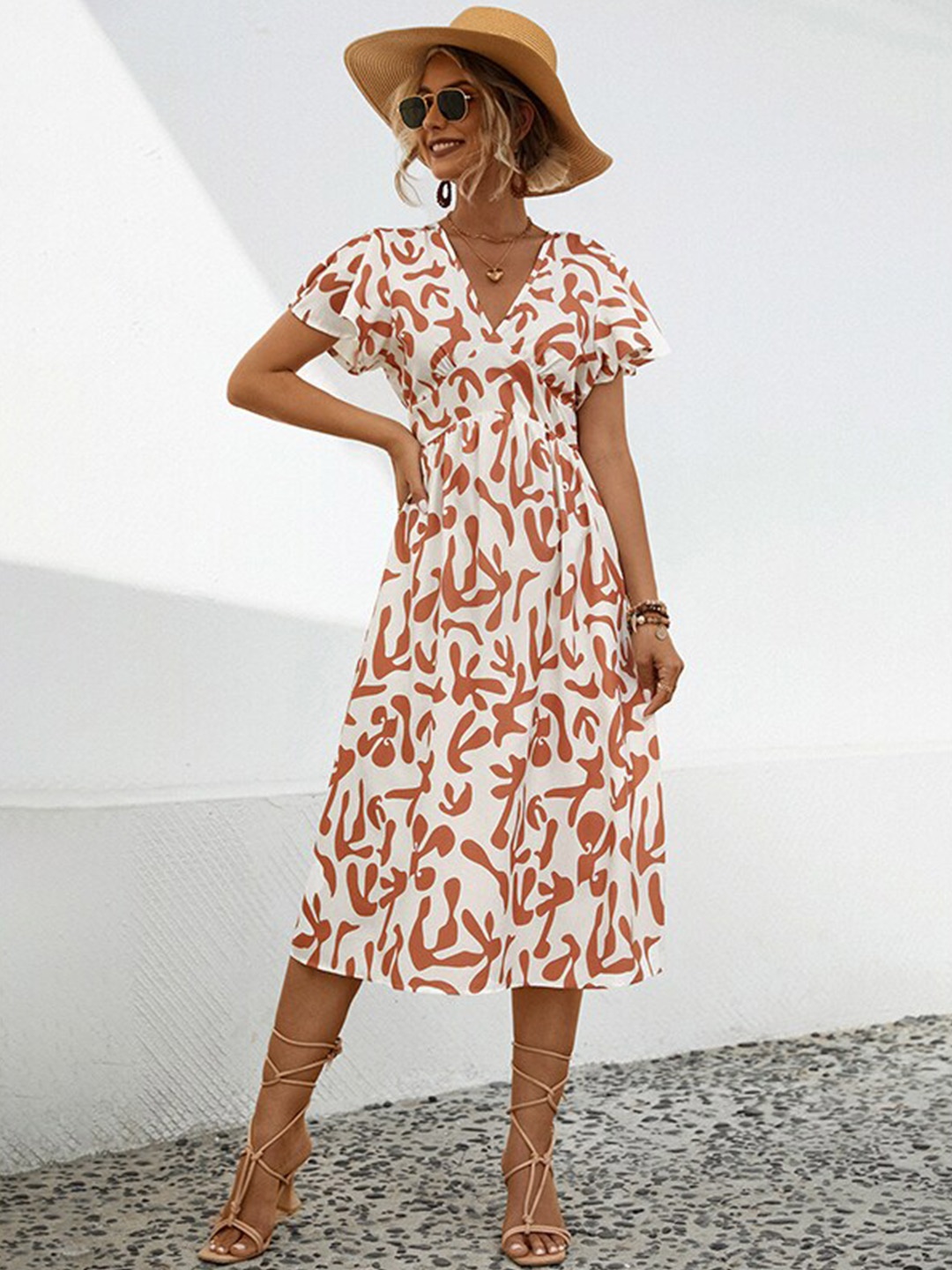 

StyleCast x Revolte Abstract Print Puff Sleeve A-Line Midi Dress, Orange