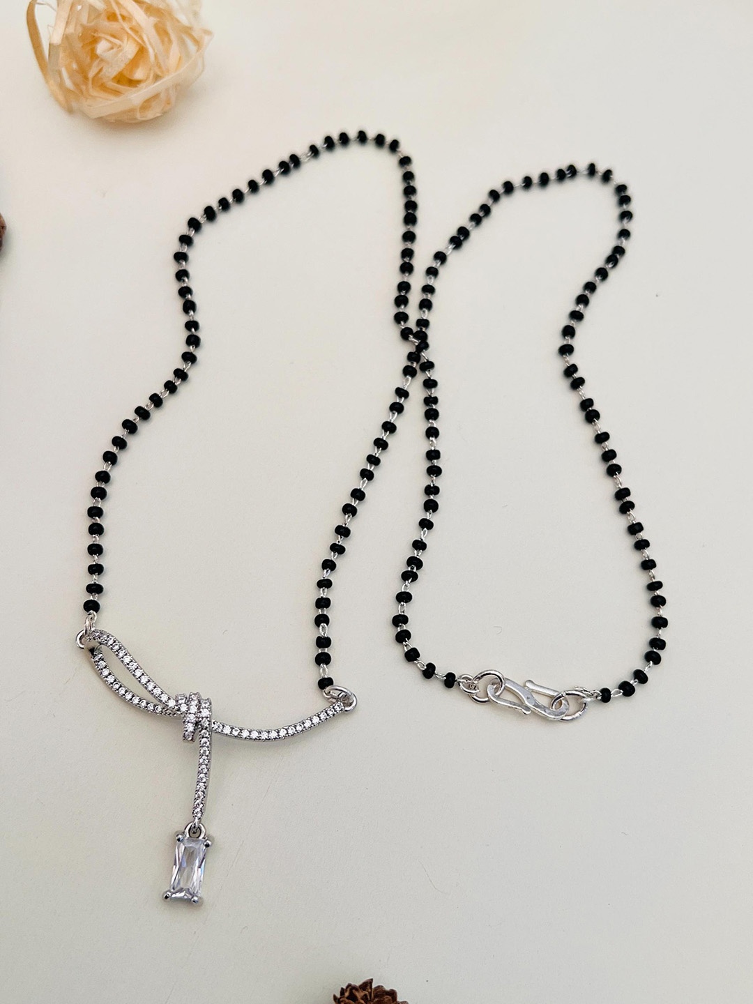 

Anouk Silver Toned Silver Plated AD-Studded & Beaded Mangalsutra