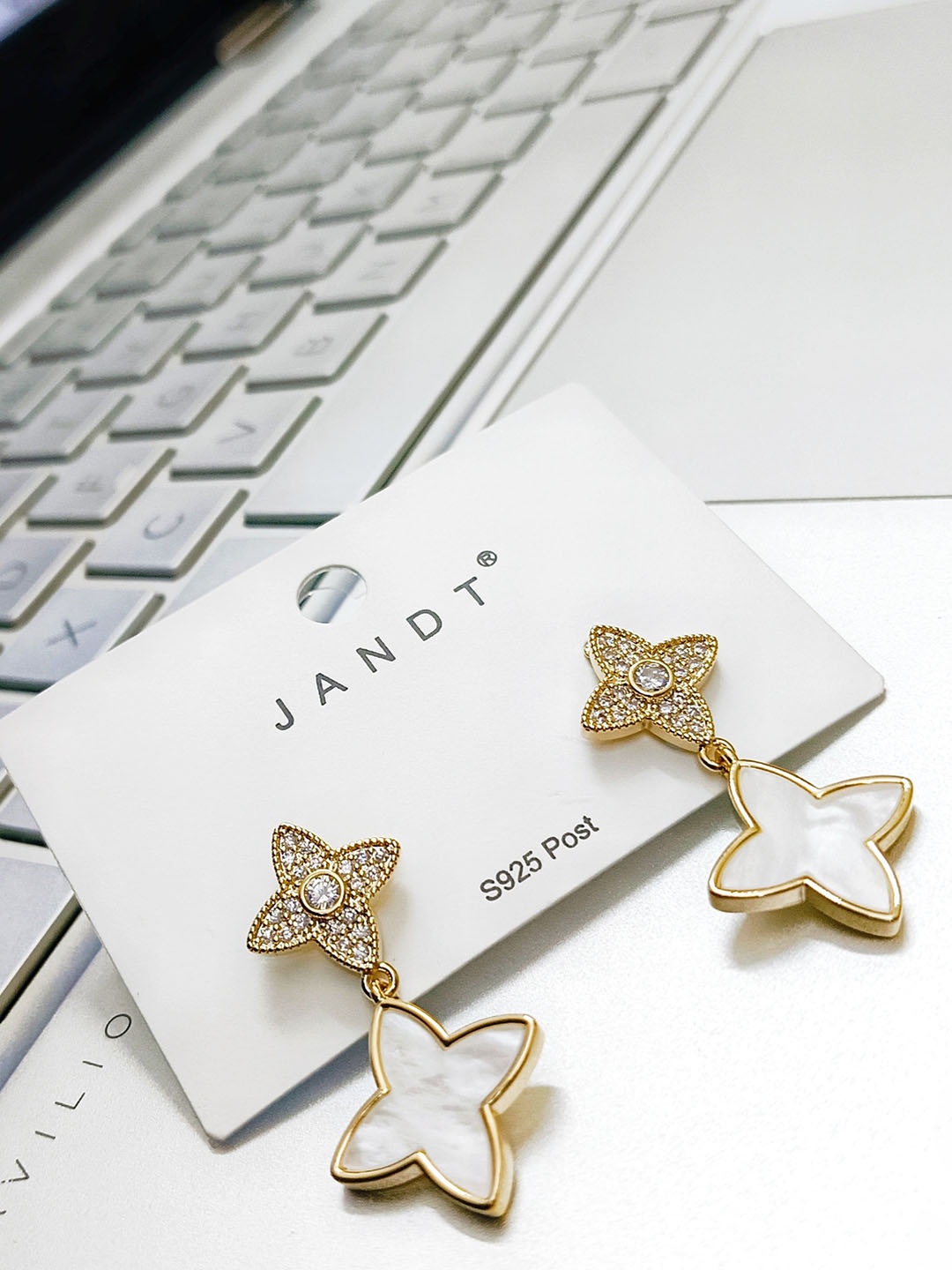 

Manikya Gold-Plated Cubic Zirconia Stone Studded Floral Stainless Steel Drop Earrings