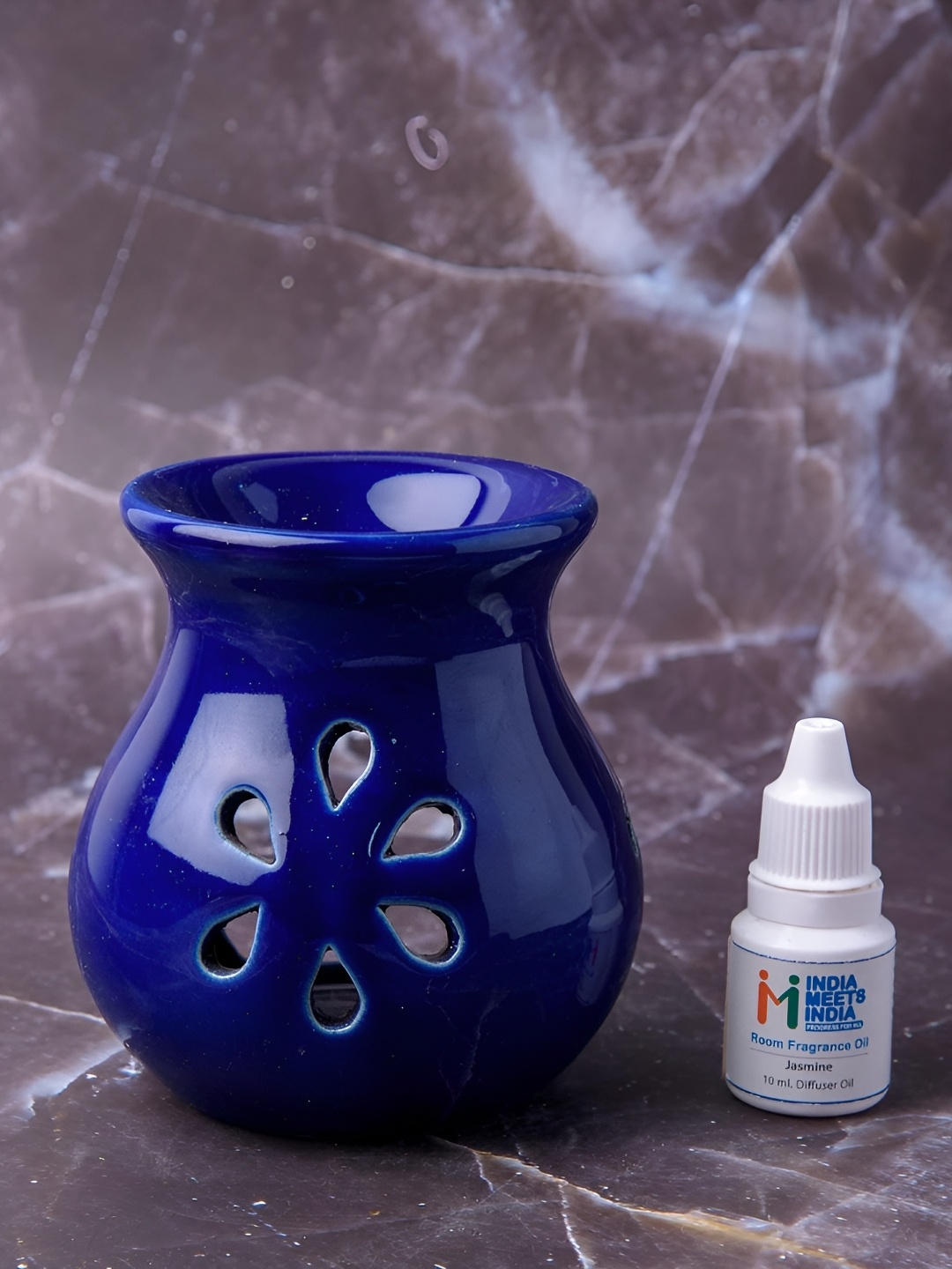 

INDIA MEETS INDIA Blue Ceramic Tea Light Candle Holder