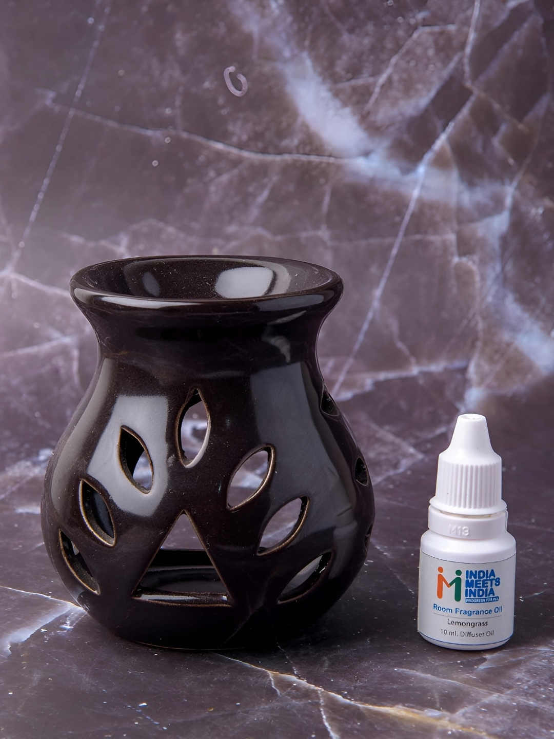 

INDIA MEETS INDIA Black Ceramic Tea Light Candle Holder