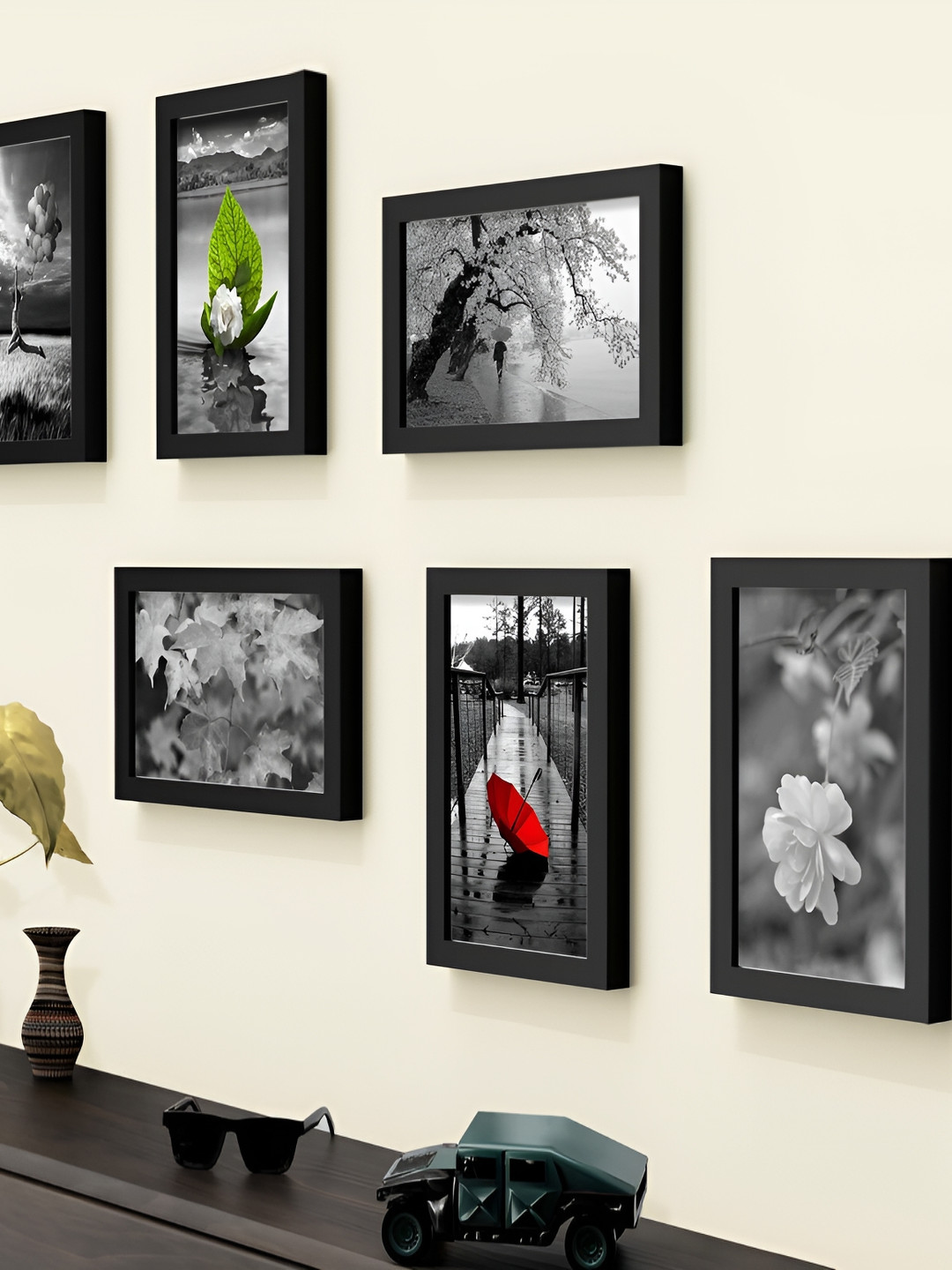 

Stuthi Arts Black 5 to 7 Pieces Wood Wall Photo Frames