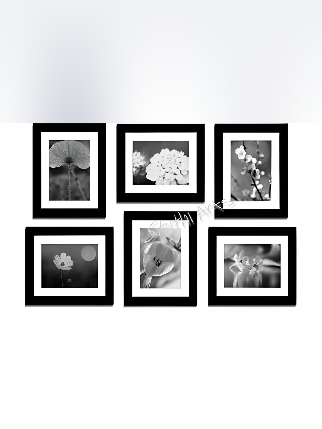 

Stuthi Arts Black 5 to 7 Pieces Wood Wall Photo Frames