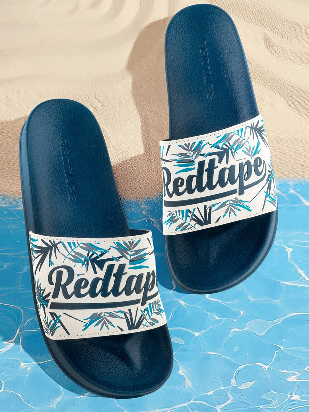 

Red Tape Women Printed Sliders, Navy blue