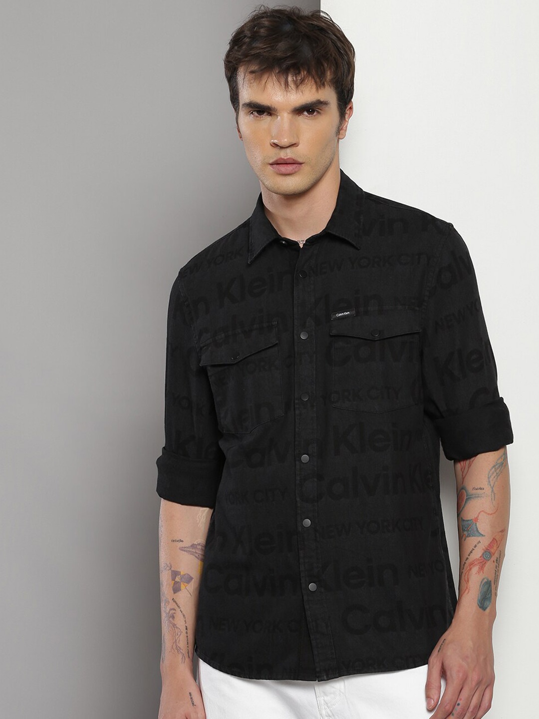 

Calvin Klein Slim Fit Typography Printed Spread Collar Pure Cotton Denim Casual Shirt, Black