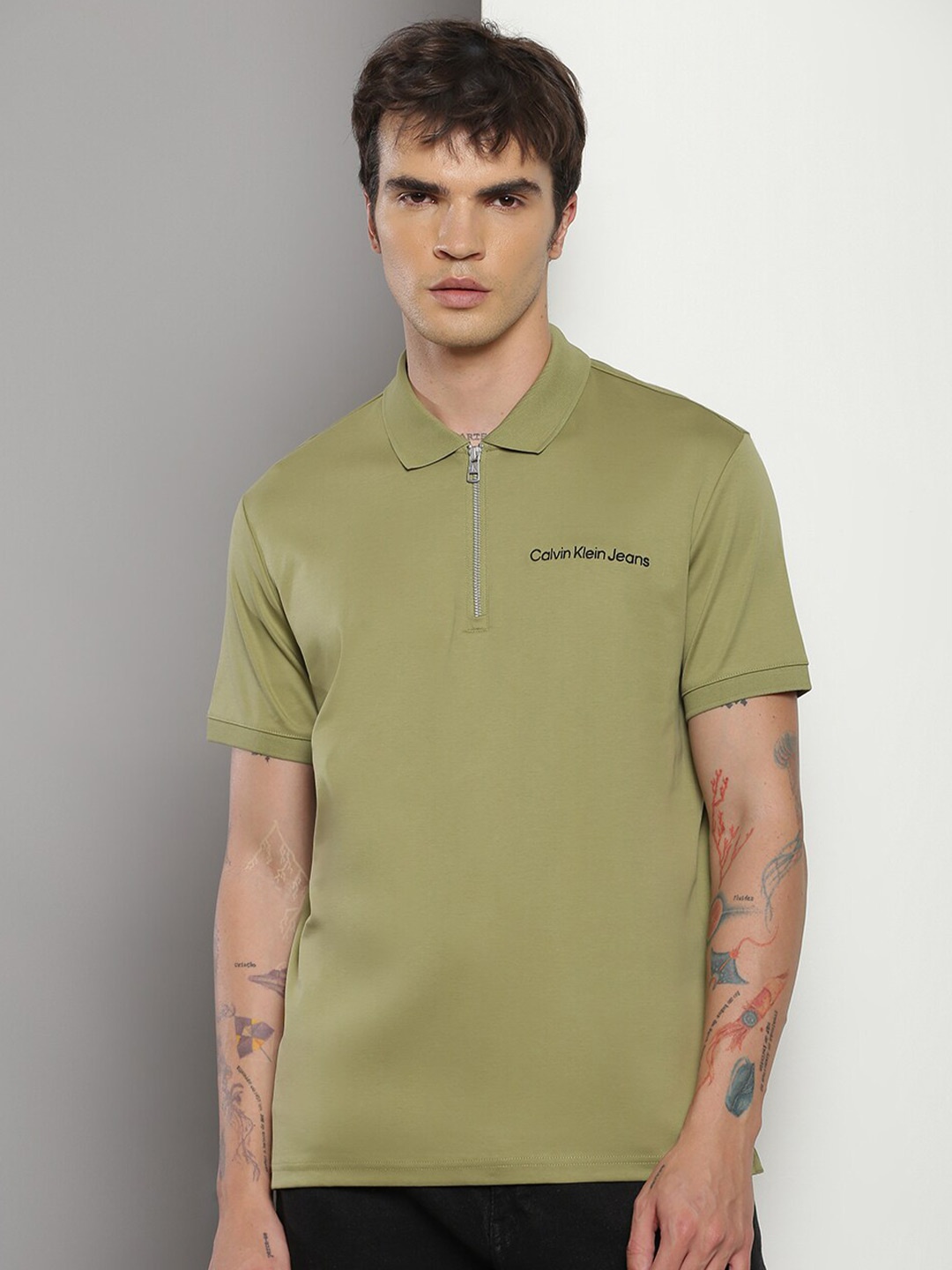 

Calvin Klein Jeans Typography Polo Collar Cotton Regular Fi T-shirt, Olive