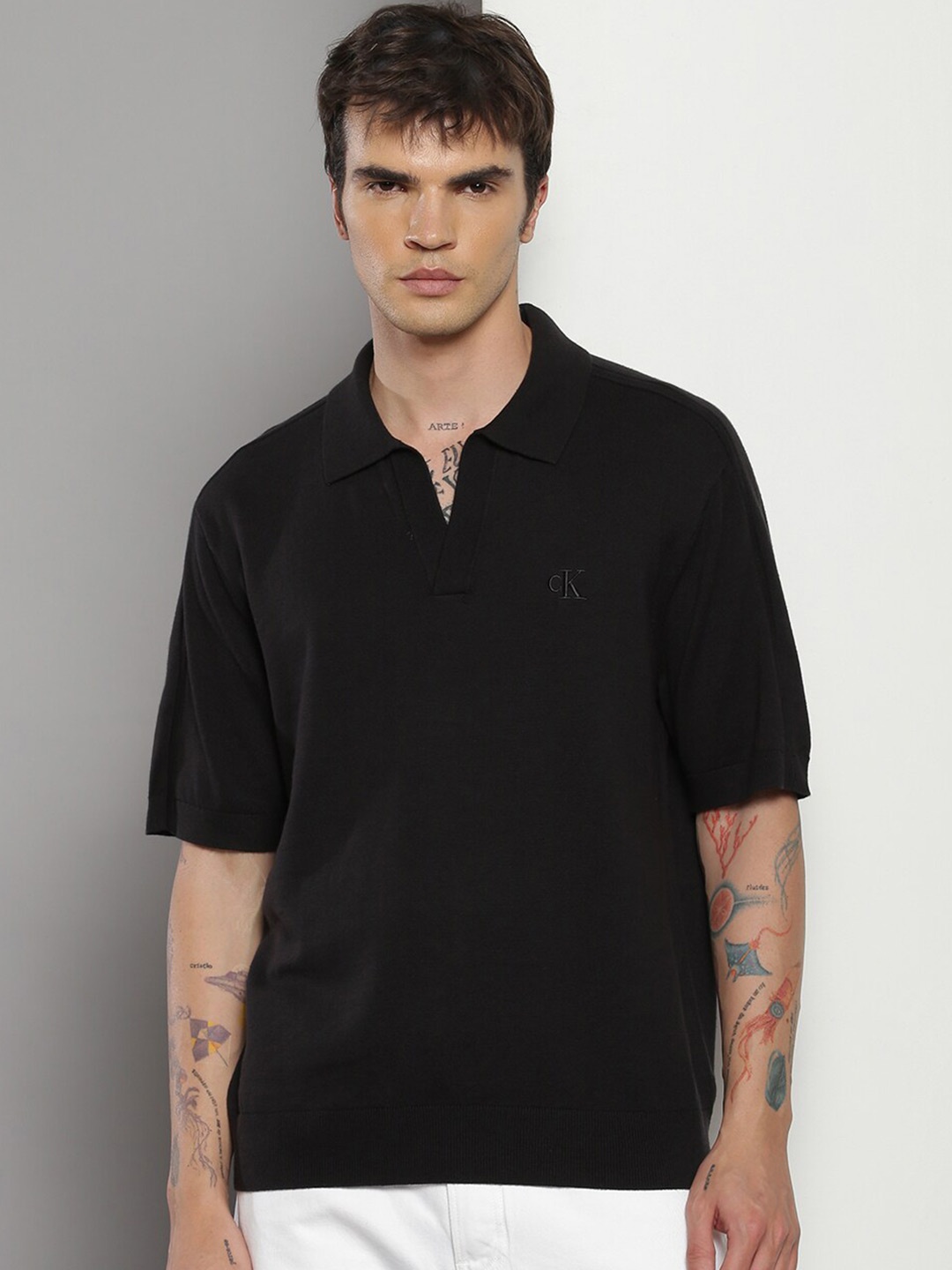 

Calvin Klein Polo Collar Short Sleeves Organic Cotton Relaxed Fit Pockets T-shirt, Black