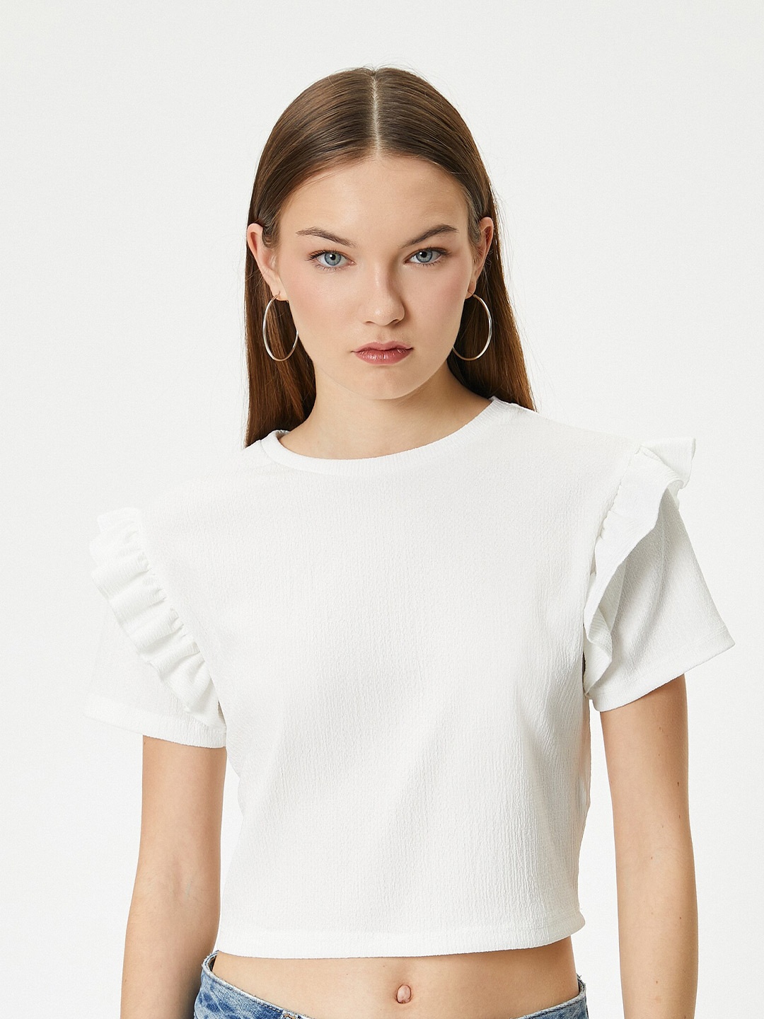

Koton Textured Self Design Round Neck Short Sleeves Crop Top, Beige