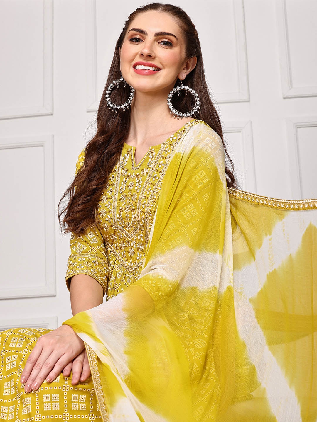 

Ishin Bandhani Embroidered Kurta with Trousers and Tie and Dye Hand Tassels Dupatta, Mustard