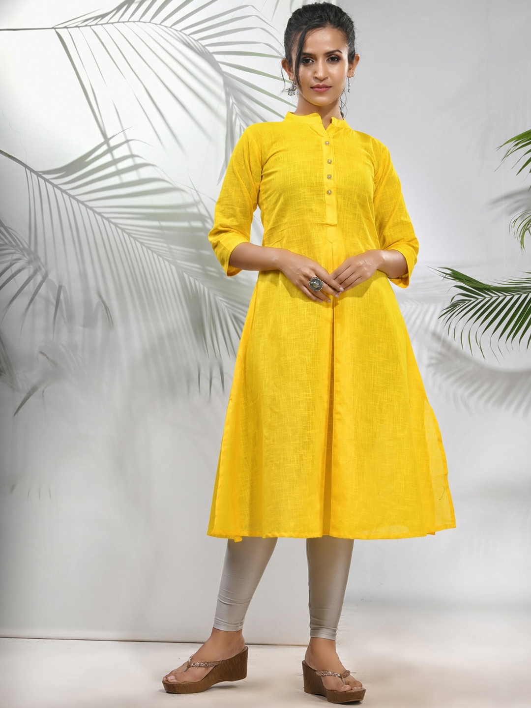 

Charukriti Cotton Thread Work Mandarin Collar Three-Quarter Sleeves A-Line Kurta, Yellow