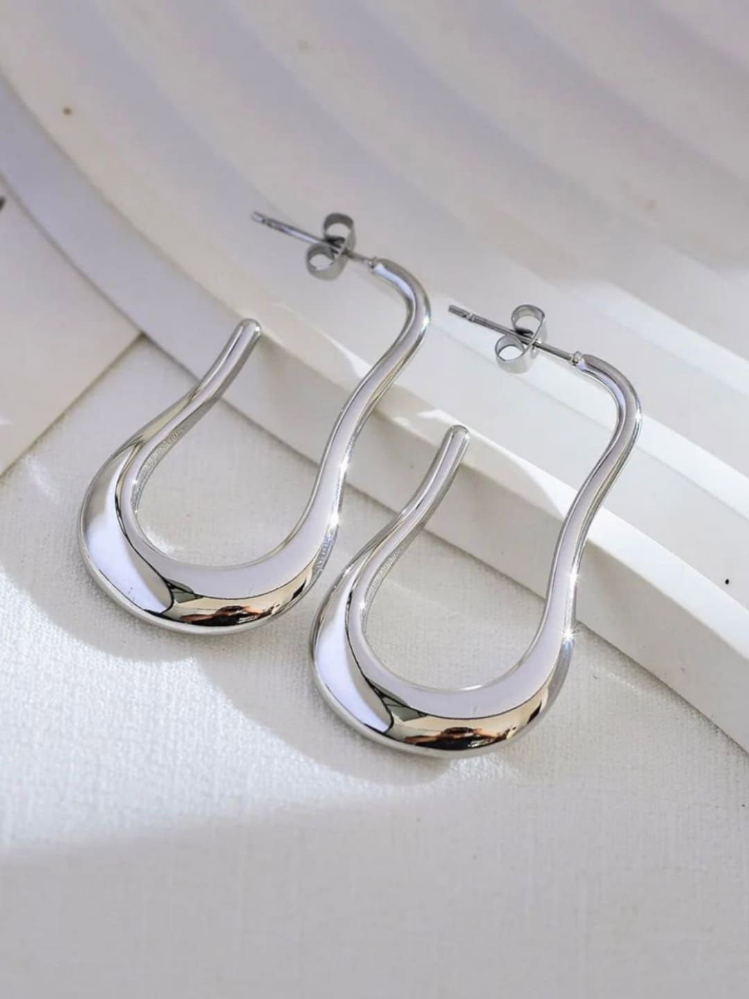 

Dorada Jewellery Rhodium-Plated Stainless Steel Contemporary Half Hoop Earrings, Silver