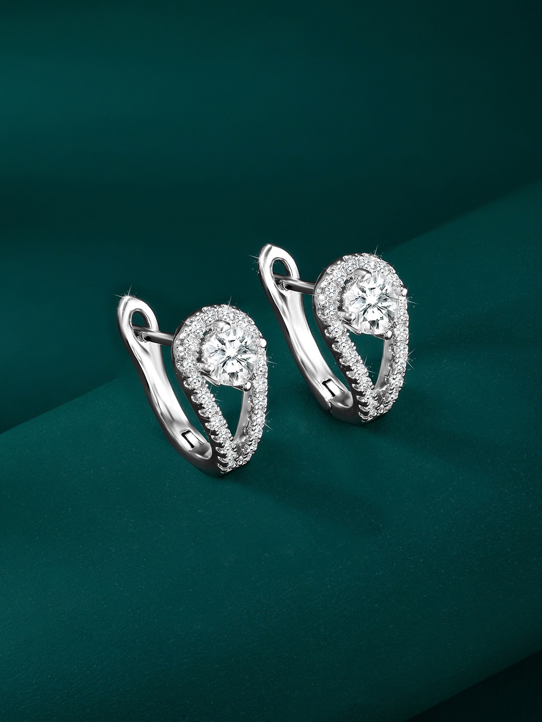 

Peora Silver-Plated Cubic Zirconia Studded Contemporary Studs